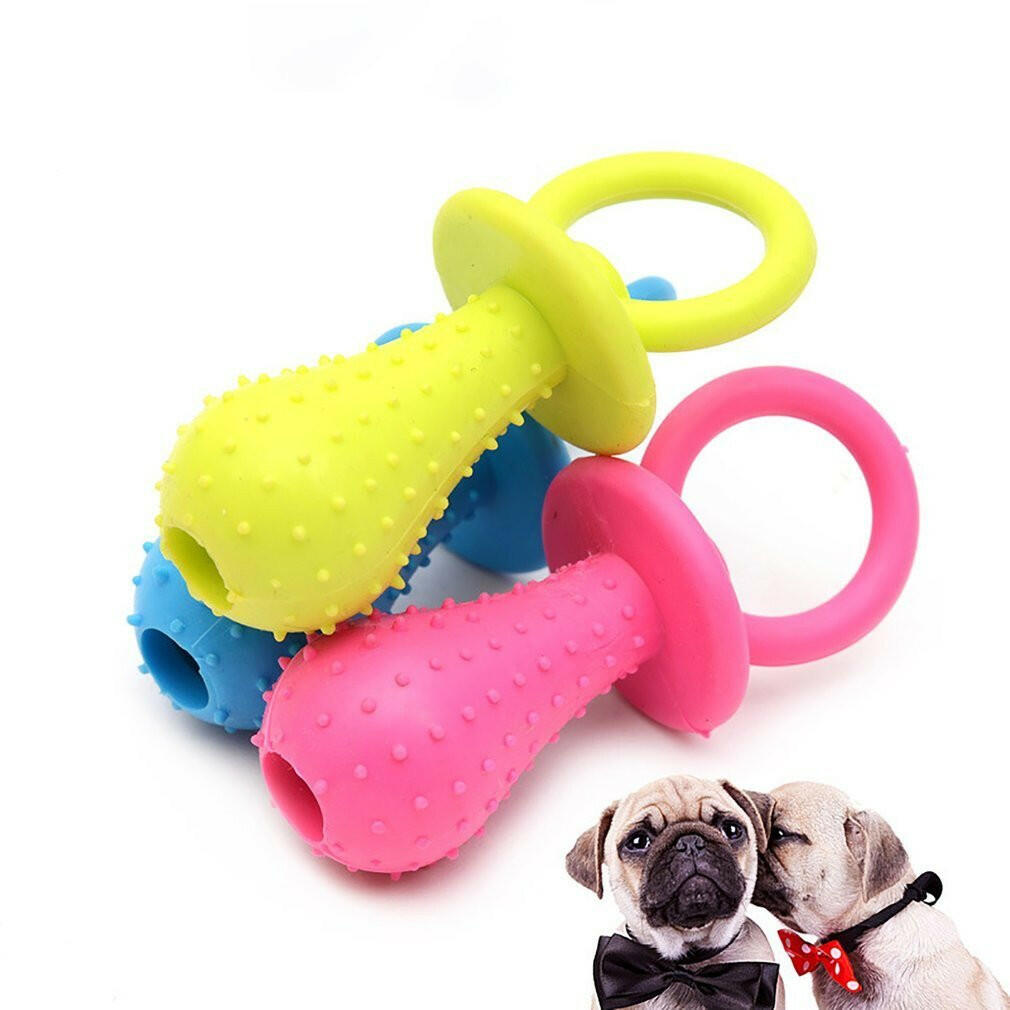 A pacifier-shaped toy for a dog. - linilee